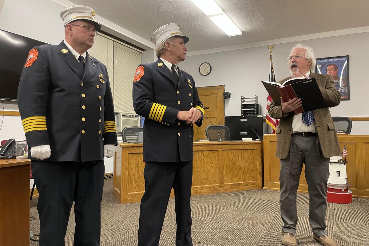 Officiant and Two Senior Officers 1