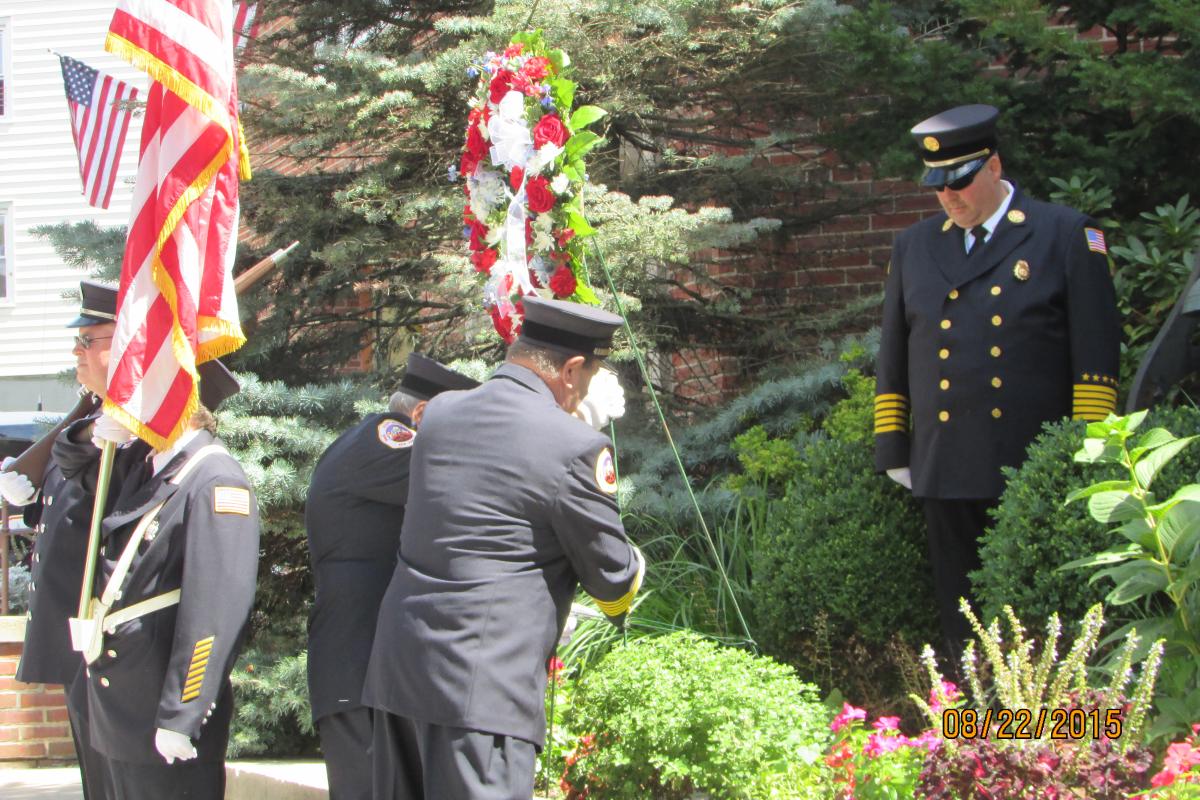 Officers Bow Their Heads in Remembrance