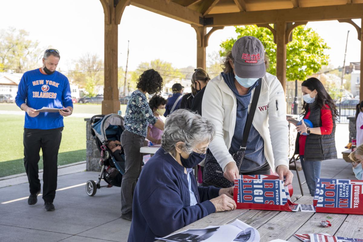 Woman Assisting an Elder with Her Birdhouse Project 1