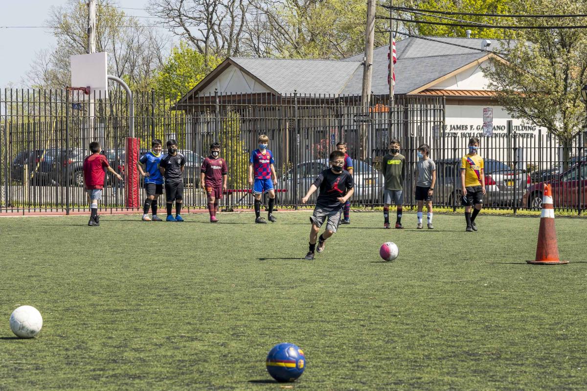Kid Kicking a Soccer Ball 2