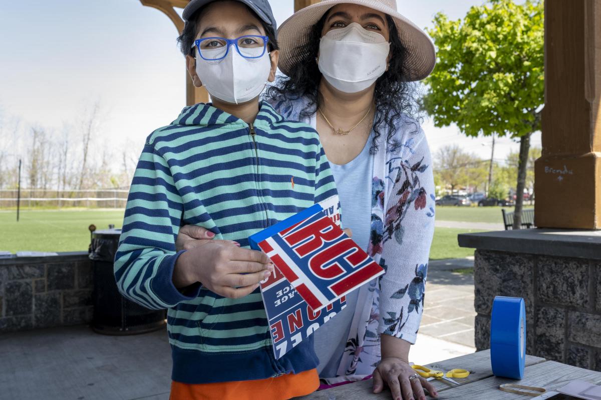 Boy and His Mom Making Birdhouses